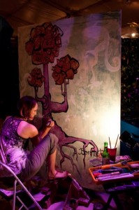 Artists painting live during the evening