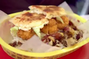 Vacation-like fried shrimp po boys in coconut sauce at Rick's White Light Diner