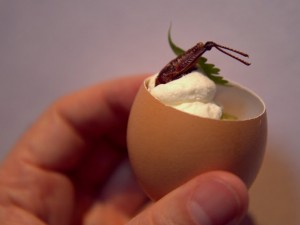 Chorizo, lime crema, and grasshopper-topped egg at La Urbana preview