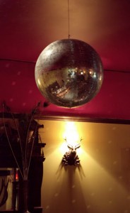 Disco balls at home with warm, vintage decor