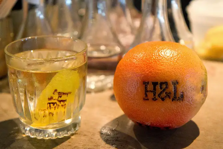 Hook & Ladder's special brand branded via iron onto citrus peels