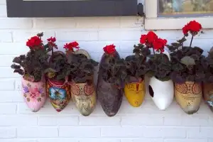 Watching Dutch shoes being made sailing to Marken, Netherlands