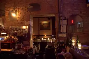 Looking across Evelyn's bar into second room