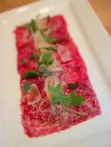 Wagyu beef carpaccio in wasabi oil