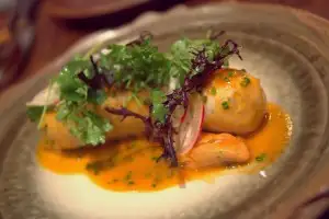 Seafood sausage ($17) over split pea miso sauce & mussels