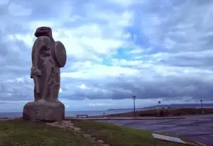 Ancient Celtic statue on the ocean in A Coruna
