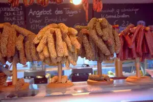 Nut-crusted sausages at Market
