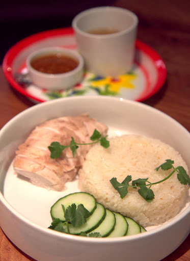 Khao Mun Gai ($16) chicken fat rice, ginger-poached chicken, Pim’s secret sauce, served with cup of intense chicken consommé