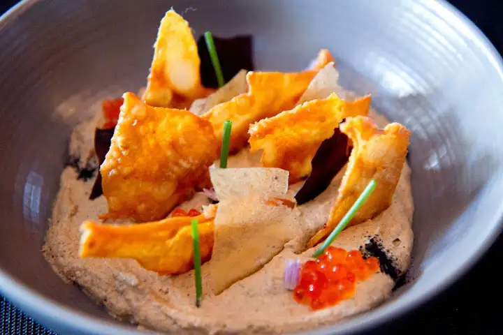 Bar food re-imagined: chicken-skin chips dipped in smoky eggplant cream at The European (see "Top Tastes" & "Imbiber")