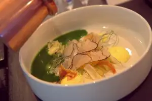 Shaved white truffles over eggs