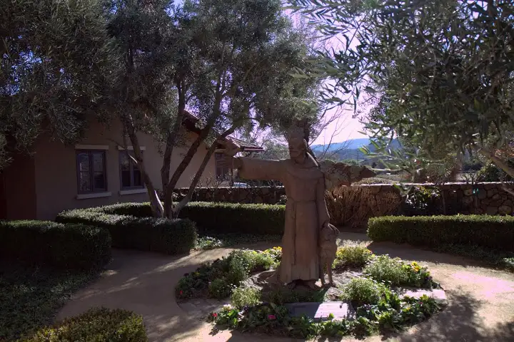 A peaceful garden surrounding a statue of St. Francis with his beloved animals (namesake of the winery and the city of San Francisco)