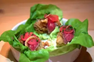 Fried oysters topped with beef carpaccio at Liholiho Yacht Club