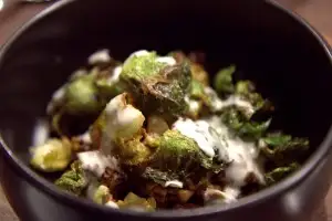 Chorizo con patacas, sunchokes, shiitake chorizo, Brussels sprouts, queso fundido 