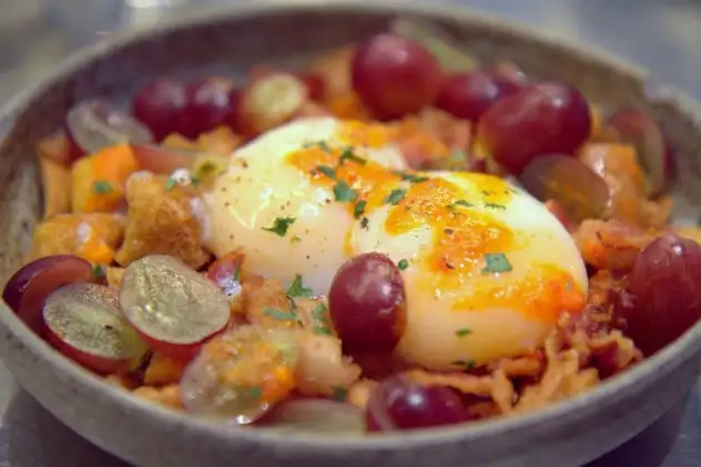 Fried potatoes, grape and egg dish at Ham & Sherry