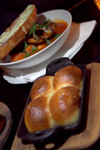 Cafe Du Nord's Parker House rolls with cioppino