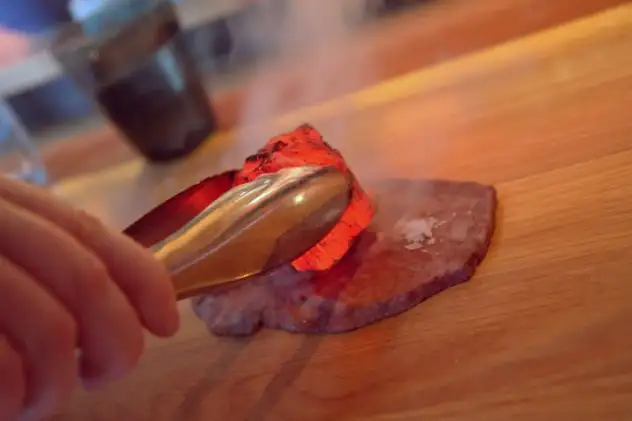 Searing raw beef with a hot cool