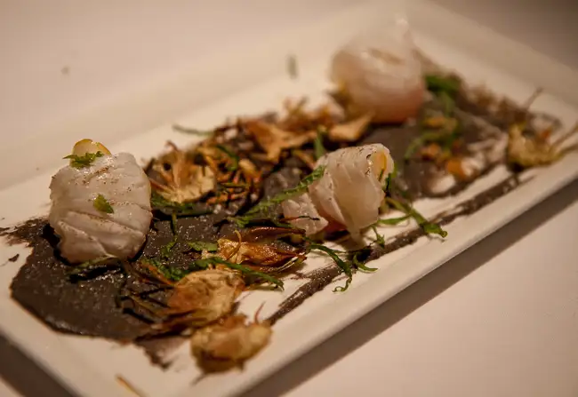 Farallon's local halibut crudo over truffled tahini with Meyer lemon and crispy artichoke