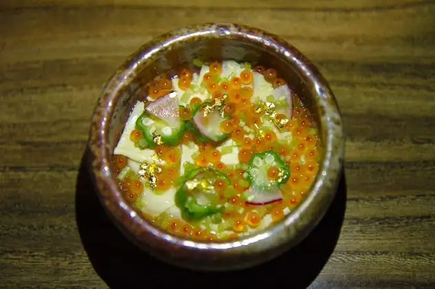 Mosu's first of hairy crab two ways: a chawanmushi-esque egg custard covered in trout roe, yuba skin, okra, radishes and gold flakes 