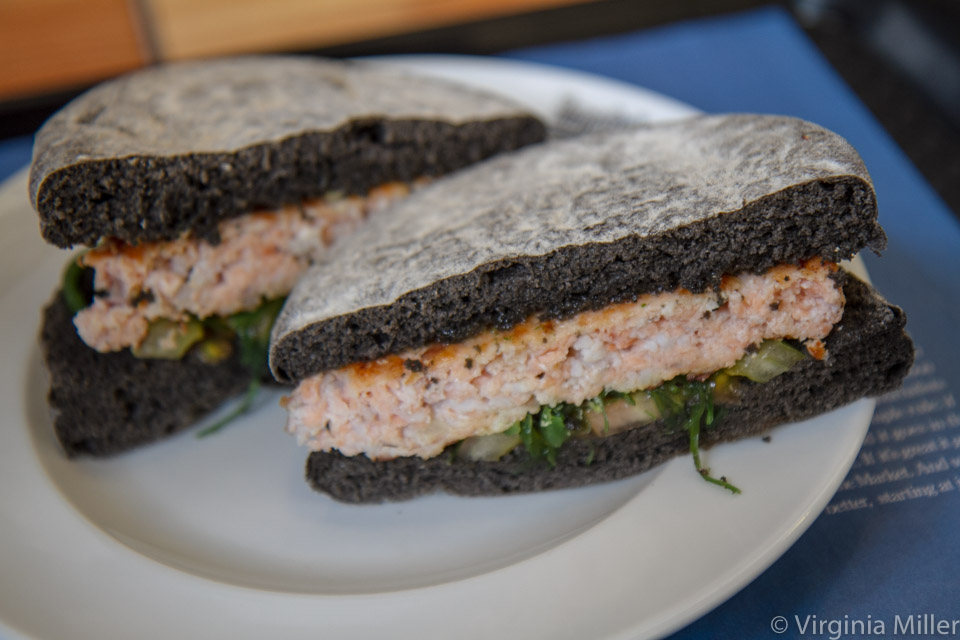 Squid ink bread and salmon sandwich at Mercado da Ribeira/Time Out Market 